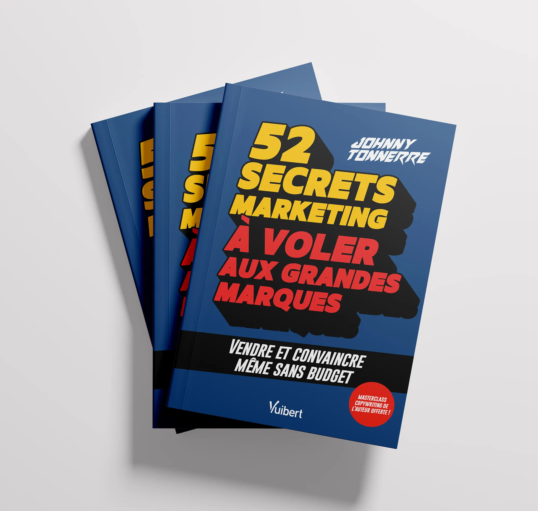 52 Secrets Marketing à Voler aux Grandes Marques, trois exemplaires empilés